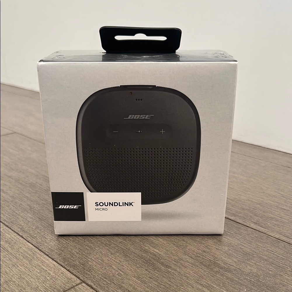 Brand new with cellophane. Bose Black Portable Speaker with Premium Sound